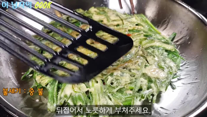 Flip the pancake and cook the other side until golden brown.