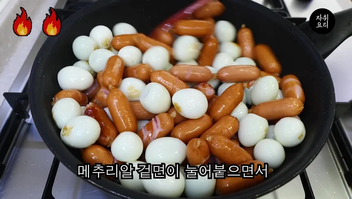 Stir-fry until sausages are cooked and slightly browned.