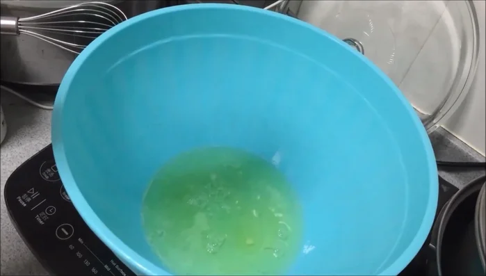 In a separate bowl, beat egg whites with remaining sugar and a pinch of salt until stiff peaks form.