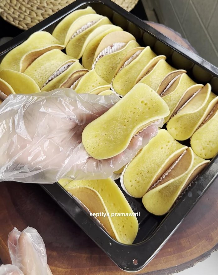 While pancakes are warm, fold each pancake in half.
