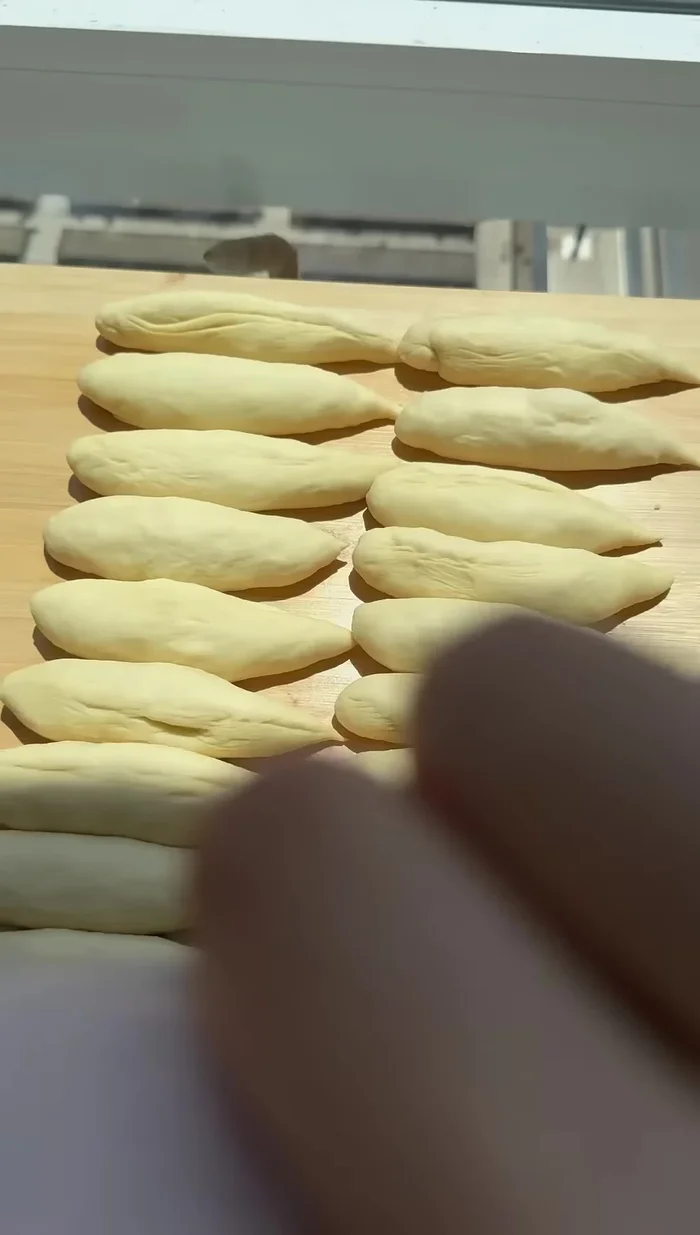 Roll the teardrop shapes into long triangles (3 inches at the base and 18 inches long). Gently pull the tip as you roll.
