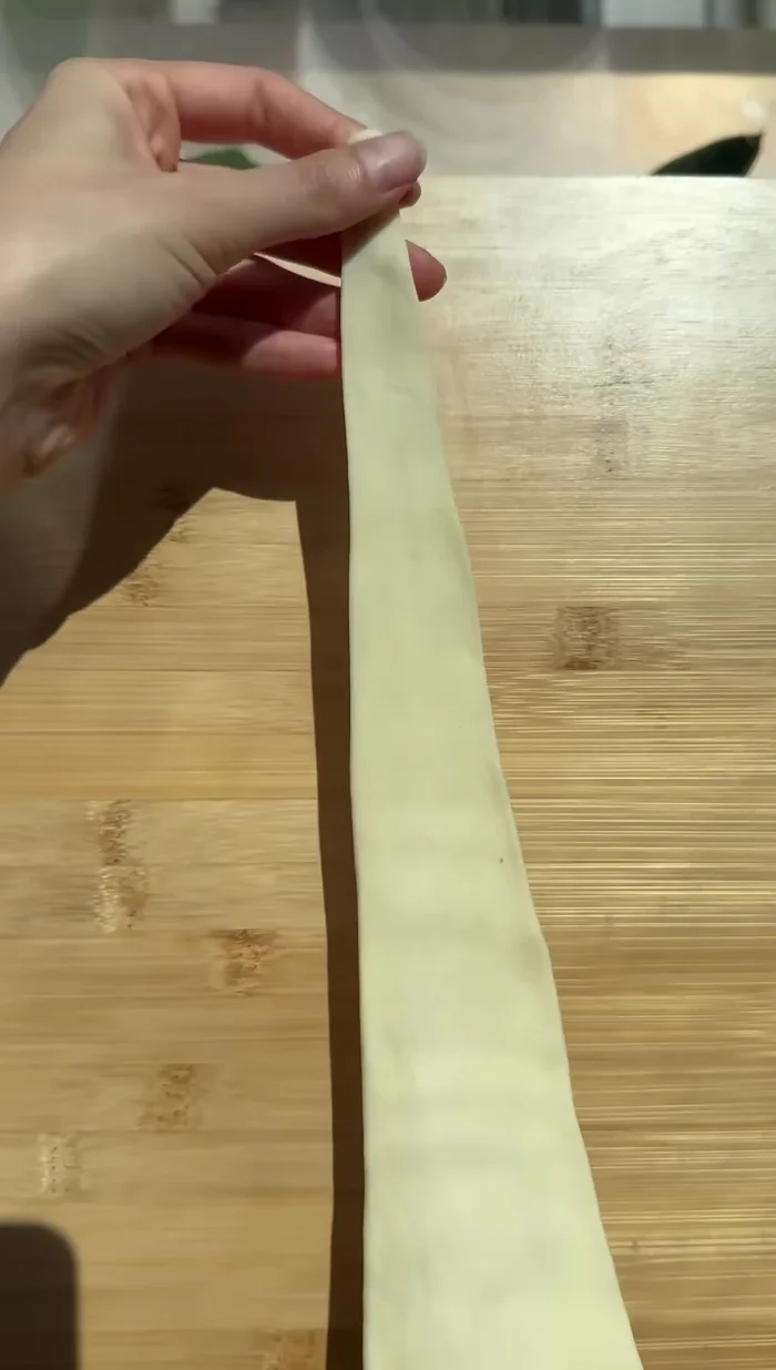 Slice a slit in the base of each triangle.