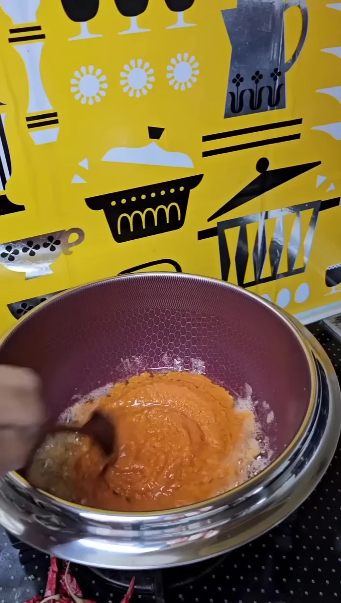 Fry spices (onion, garlic, ginger, cumin, chili powder, salt) in oil until fragrant and oil starts to rise to the top.