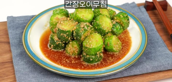 Wash and thinly slice cucumbers. (Consider removing seeds for less water)