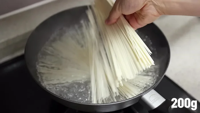 Boil noodles for 2 servings according to package instructions (about 4 minutes).
