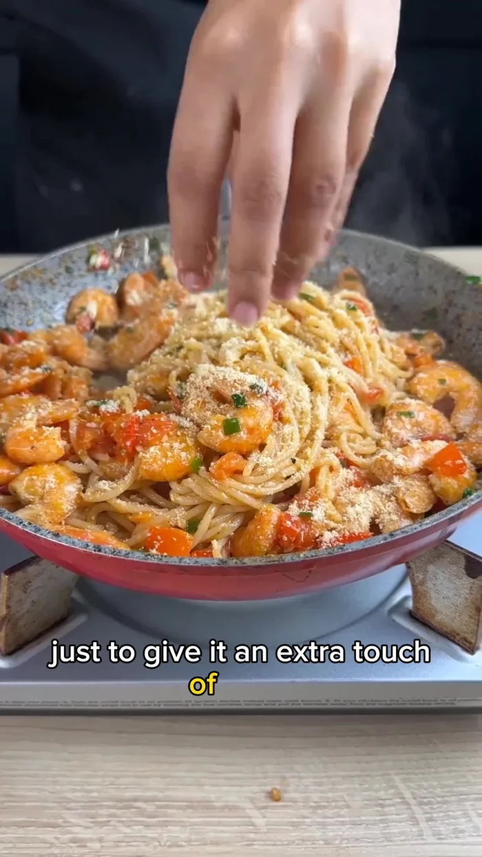 Grate Parmesan cheese on top (optional) and mix again to incorporate.