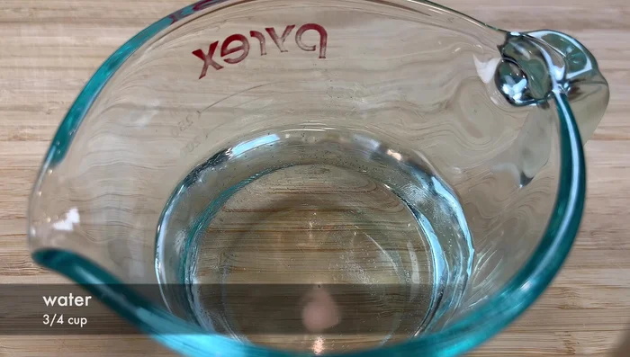 Mix corn starch with cold water until dissolved.