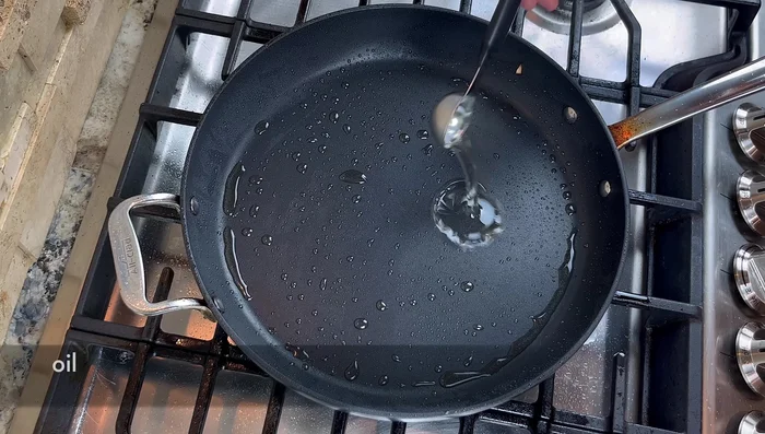 Add more oil to the pan. Stir-fry ginger slices to release flavor. Add beef and pan-fry until slightly golden brown.