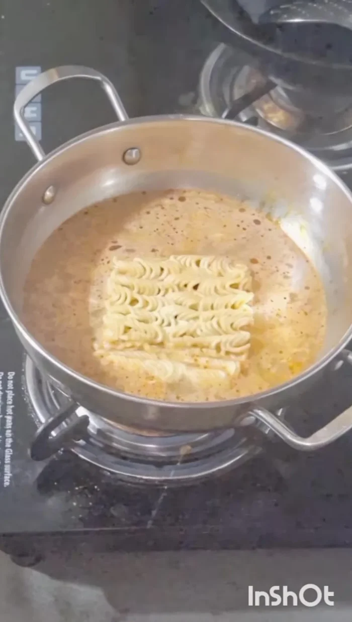 Cook until noodles are tender and vegetables are slightly softened.