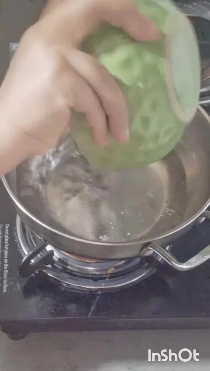 Heat water in a pan.
