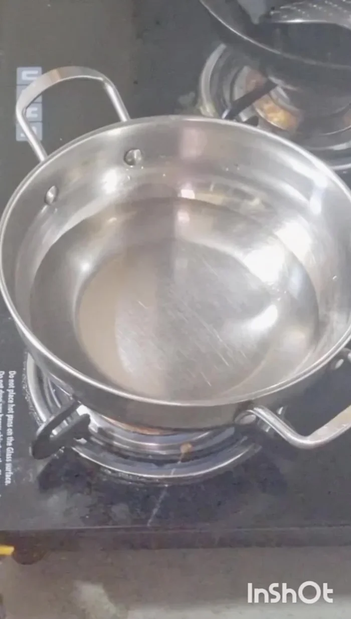 Add noodle packet to boiling water.