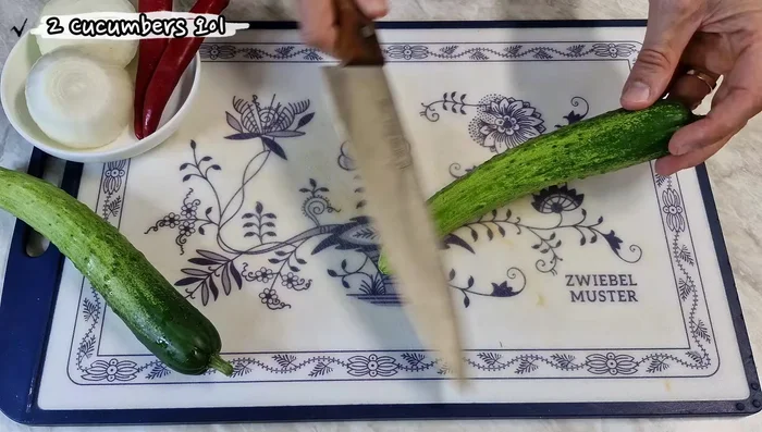Prepare the cucumbers: Wash and scrub cucumbers to remove any thorns. Slice thinly or use a grater. Add salt and let sit to draw out water. This brine will be used later.