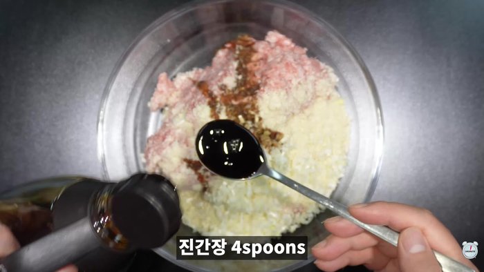 Prepare the tteokgalbi batter: Combine pork mince, bread crumbs, chopped green onion, soy sauce, cooking wine, sugar, minced garlic, oyster sauce, sesame oil, and pepper. Mix well.