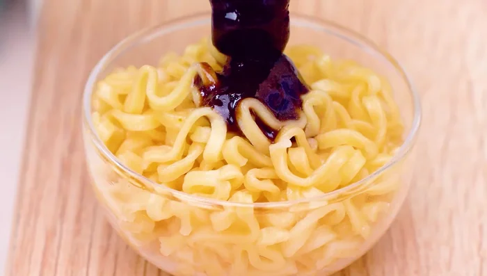 Garnish with sesame seeds, and possibly other ingredients based on preference.
