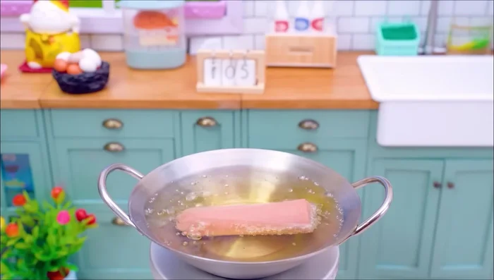 Prepare and cook sausage.