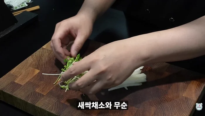 Plate it with some sprouts and vegetables.