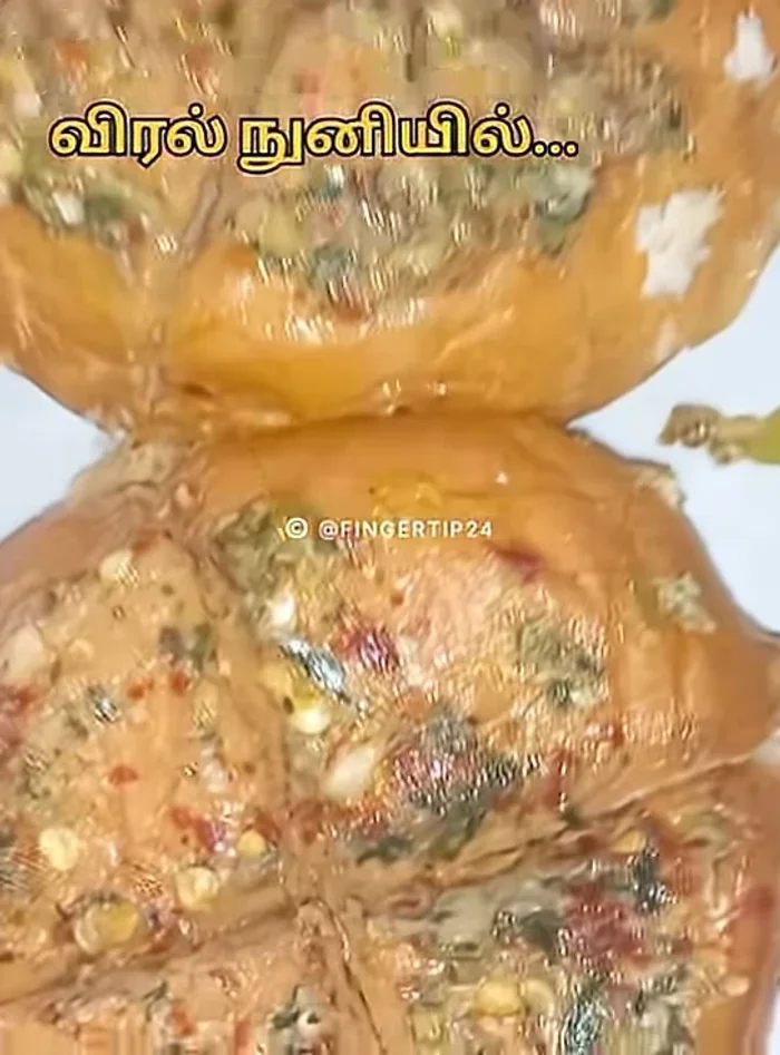 Add a layer of cheese on top of the sauce.