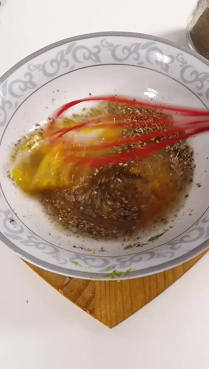 Add the drained vegetables to the egg mixture.