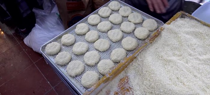 Shape the dough around the filling, sealing it completely. Roll in breadcrumbs.