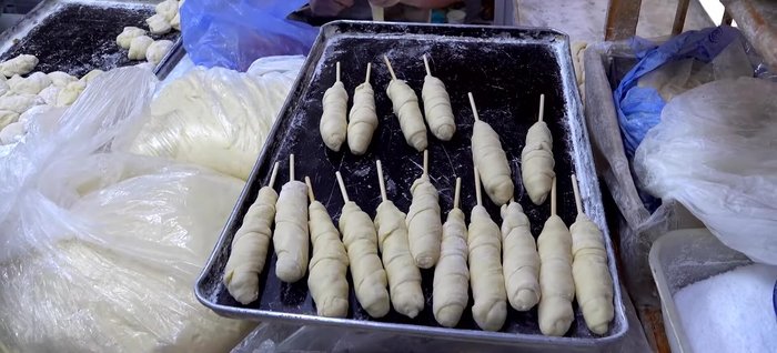Prepare the Yak Croquette filling: Finely chop cabbage, carrots, and apple. Mix with a creamy dressing.