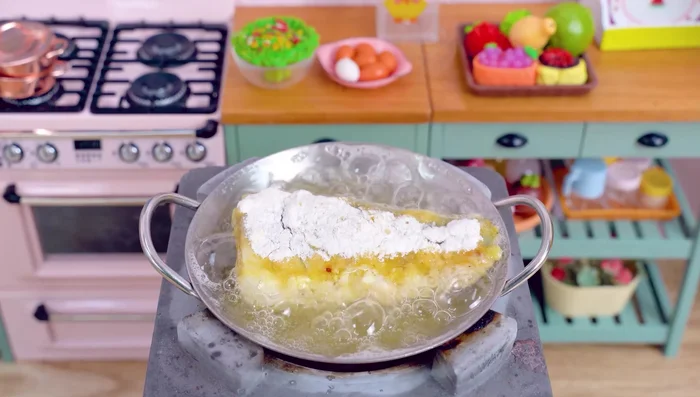 Fry the fish until golden brown, flipping halfway.