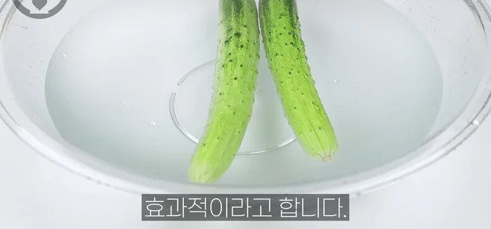Wash cucumbers thoroughly under running water, scrubbing with a soft cloth to remove any impurities. Sprinkle with coarse salt, rub gently, and rinse again. (14.839)
