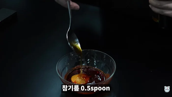Prepare Buldak soy sauce: Mix buldak sauce, vinegar, soy sauce, sesame oil, and sugar.