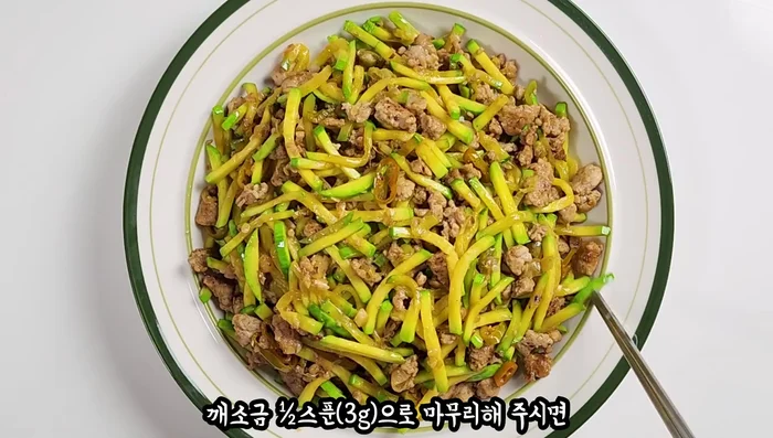 Serve the stir-fried ingredients over hot rice.